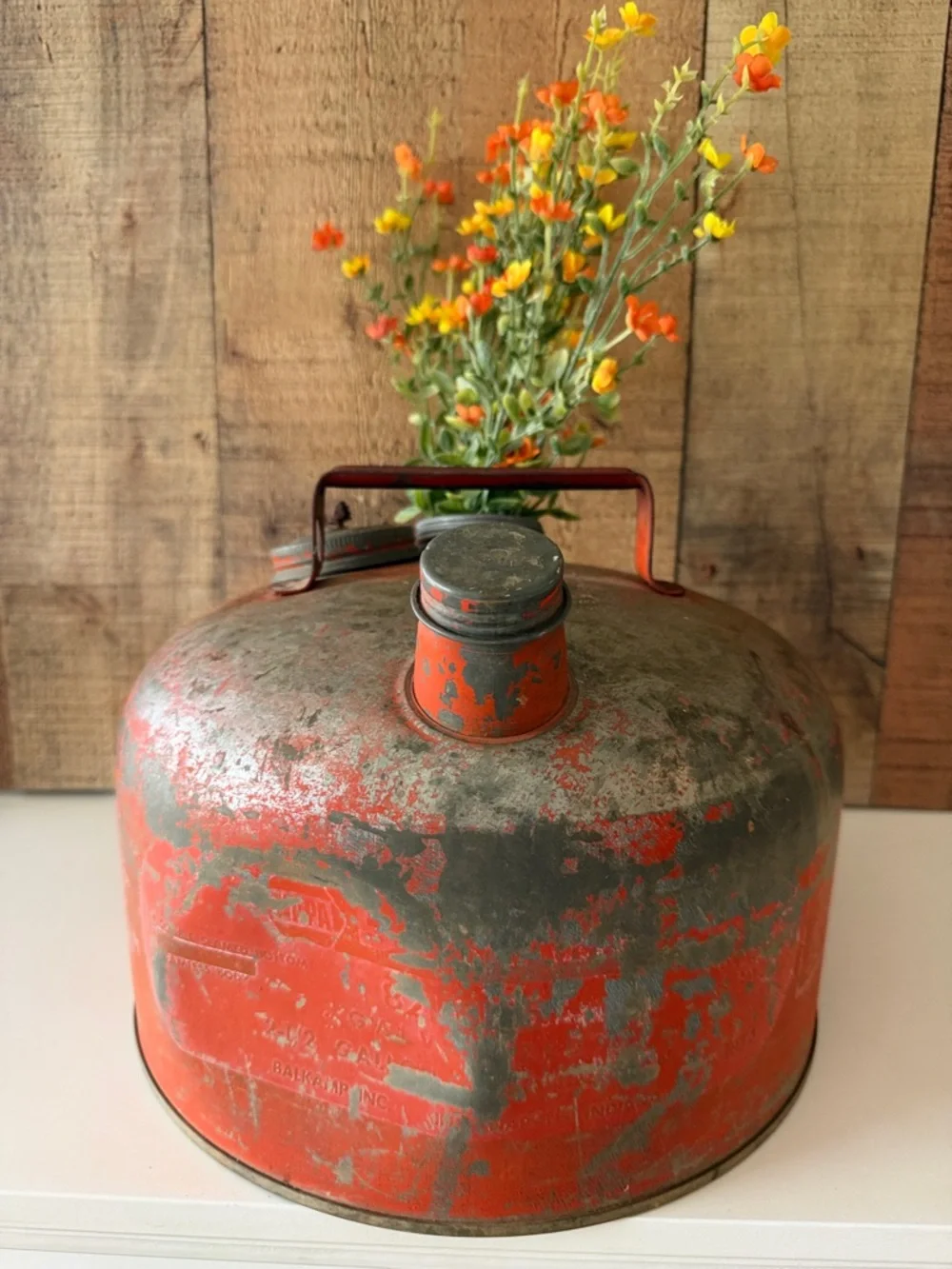 Vintage Rustic Distressed Orange Metal Gas Can with Faux Floral